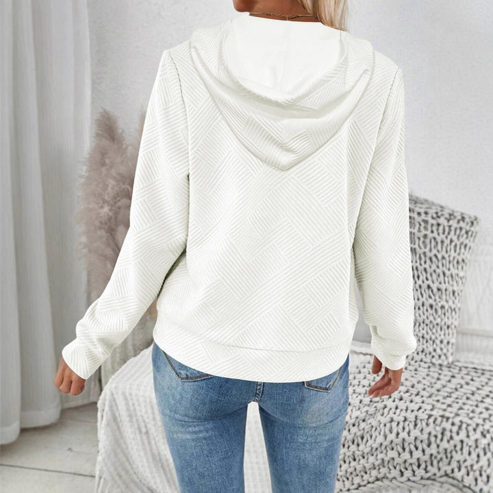 Damernas moderiktiga sweatjacka med strukturerad design och hög krage Mirla-Eva Jonsson