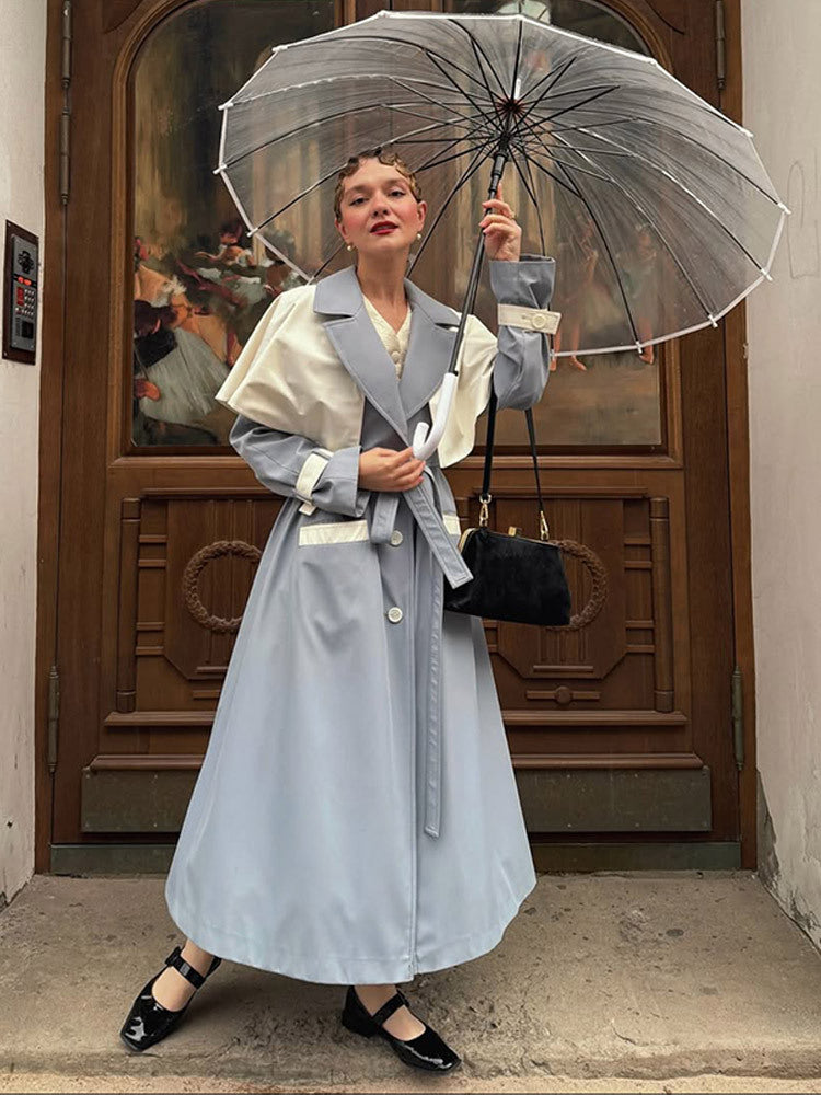 Damernas moderiktiga trenchcoat med kontrasterande färgdesign och eleganta detaljer Mirla-Eva Jonsson