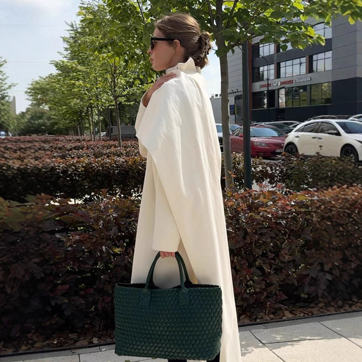Damernas moderiktiga vadderade jacka med hög krage och asymmetrisk design Eva Jonsson-Eva Jonsson