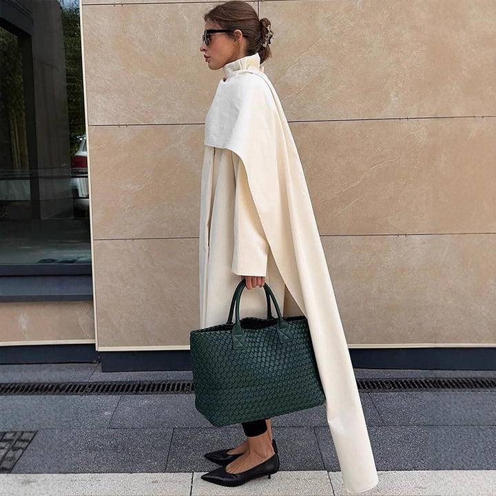 Damernas moderiktiga vadderade jacka med hög krage och asymmetrisk design Eva Jonsson-Eva Jonsson
