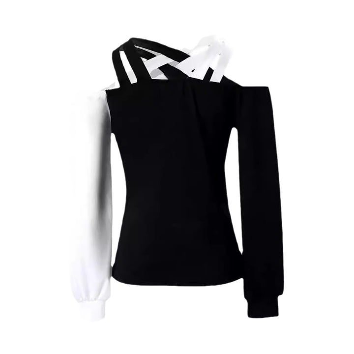 Damernas moderna plagg med cut-out-design och asymmetriska ärmar Mirla-Eva Jonsson