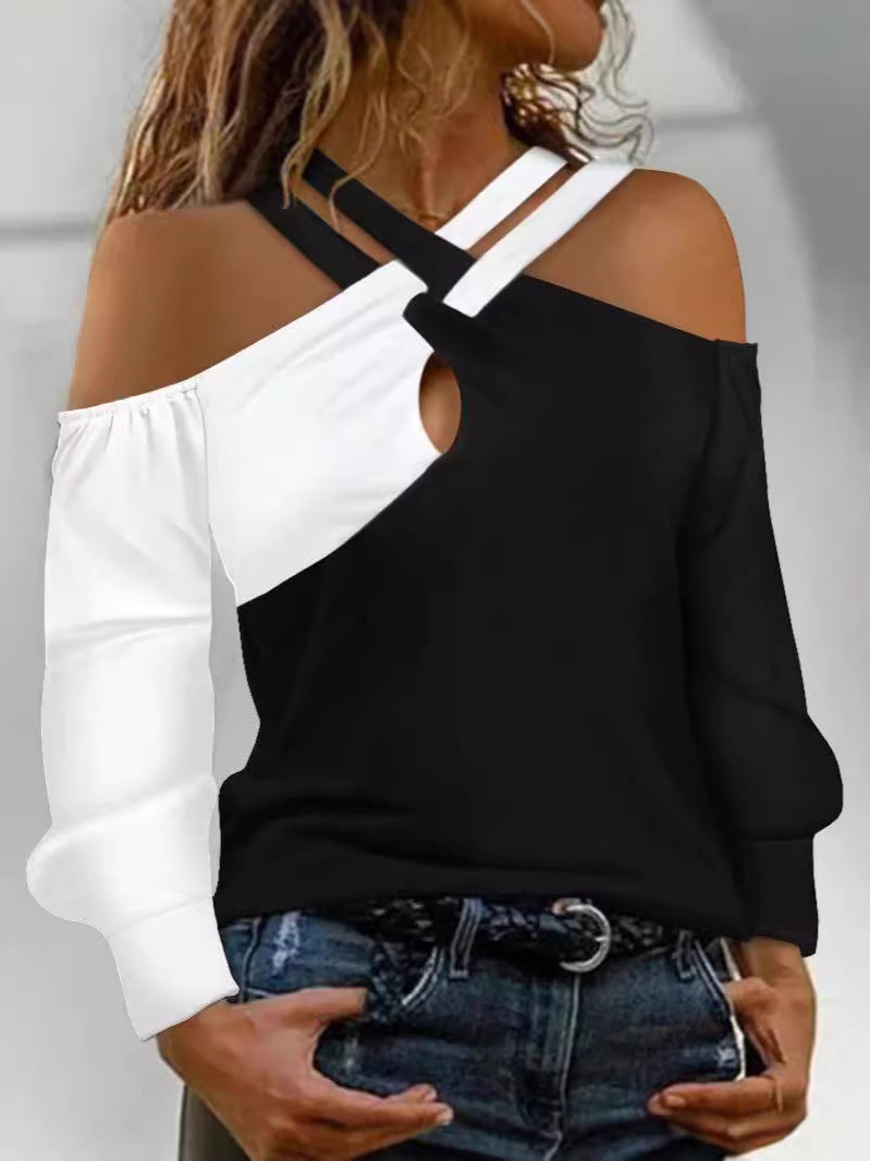 Damernas moderna plagg med cut-out-design och asymmetriska ärmar Mirla-Eva Jonsson