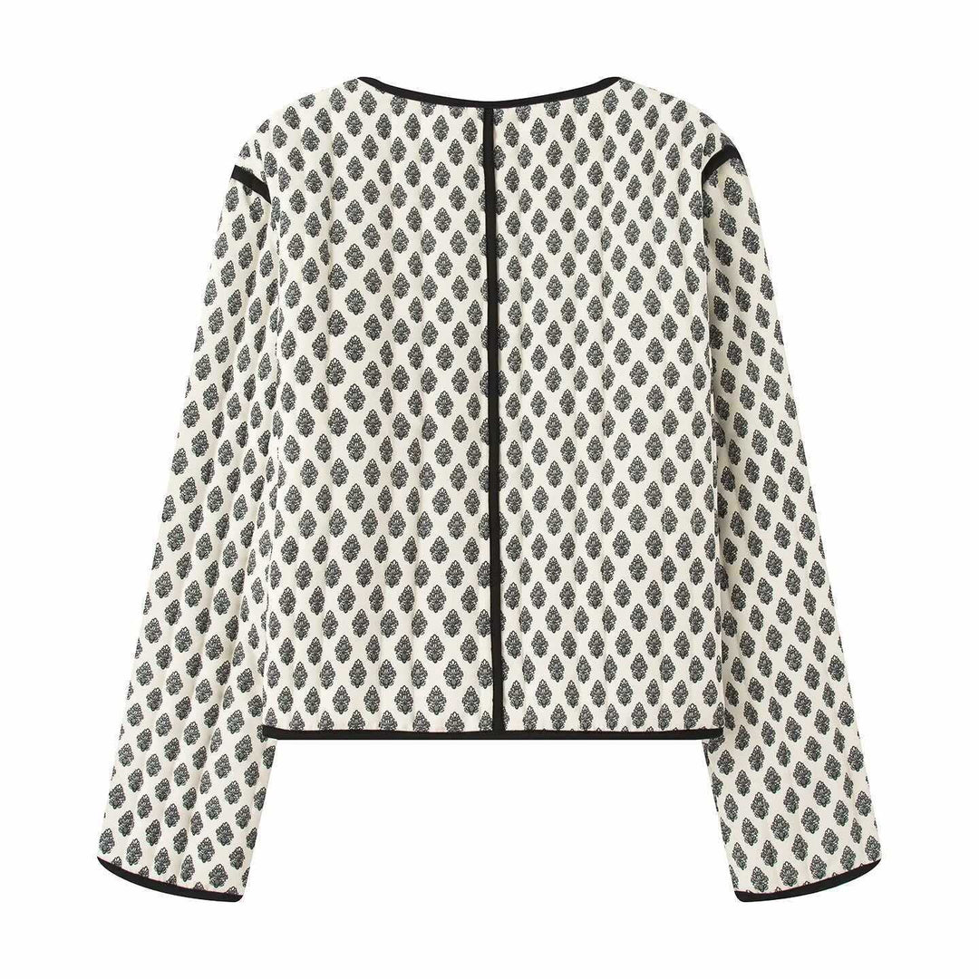 Damernas modetrendade västjacka med geometriskt mönster och praktiska fickor Mirla-Eva Jonsson