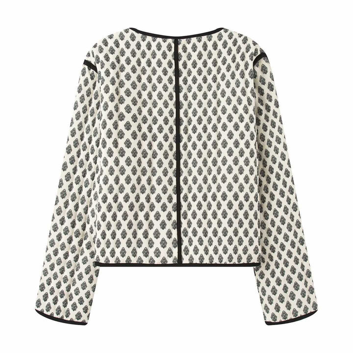 Damernas modetrendade västjacka med geometriskt mönster och praktiska fickor Mirla-Eva Jonsson