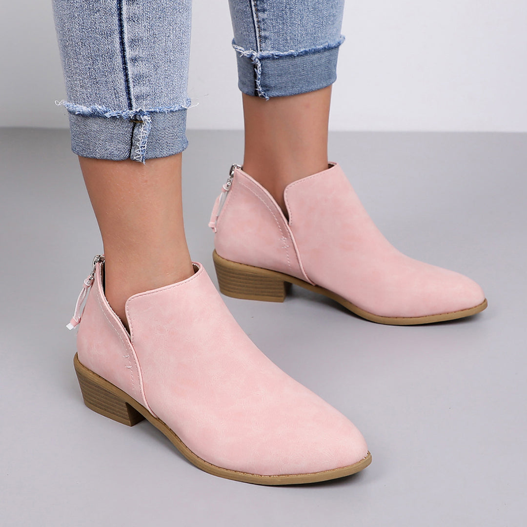 Damernas modetrendiga ankelboots med sidodragkedja och dekorativa kvastar Mirla-Eva Jonsson