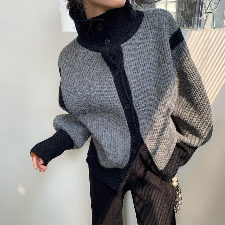 Damernas modetröja med hög krage och eleganta knappdetaljer Mirla-Eva Jonsson
