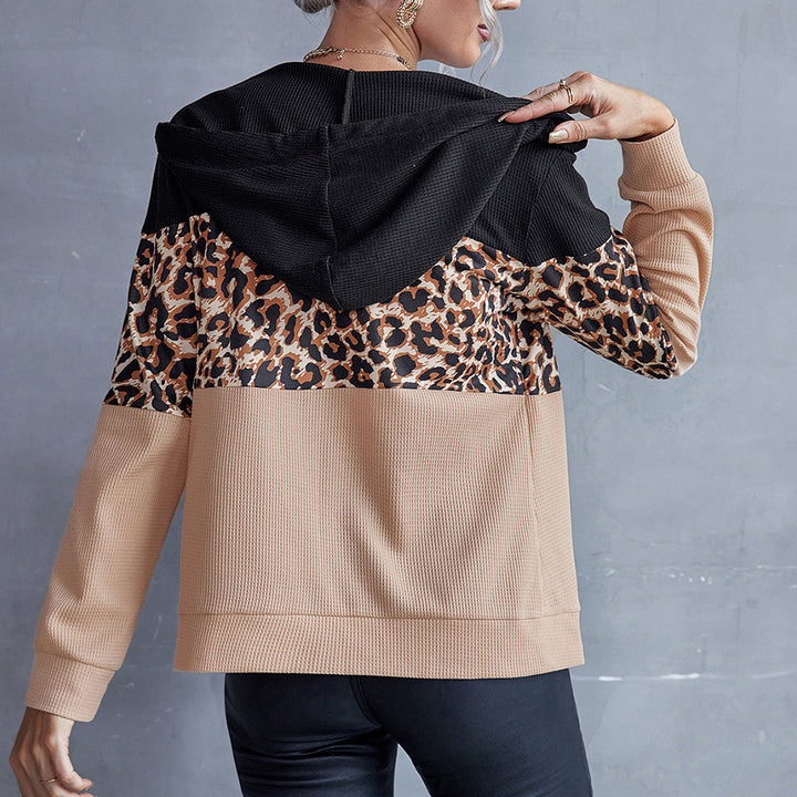 Damernas modiga hoodie med djurtryck och kontrasterande ärmar Eva Jonsson-Eva Jonsson