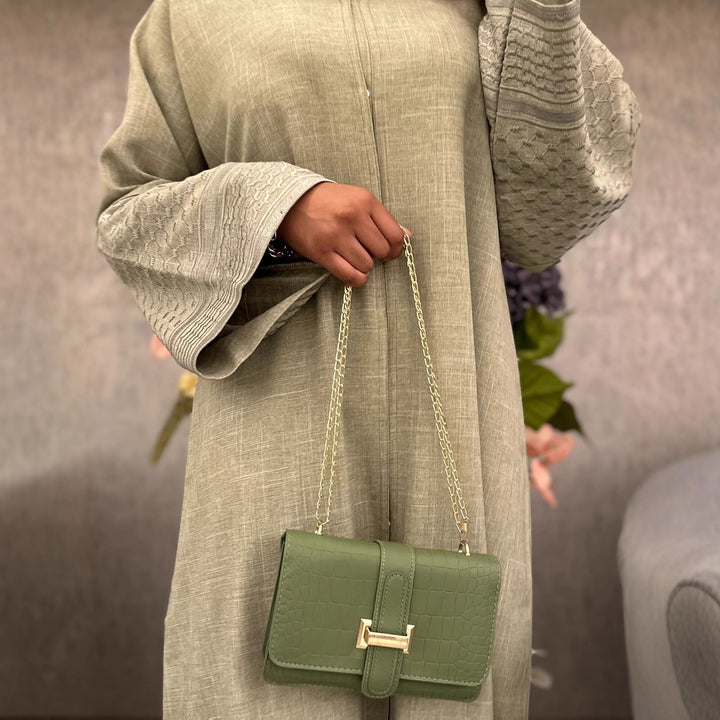 Damernas modiga kaftanklänning med elegant skärning och detaljerade ärmar Mirla-Eva Jonsson