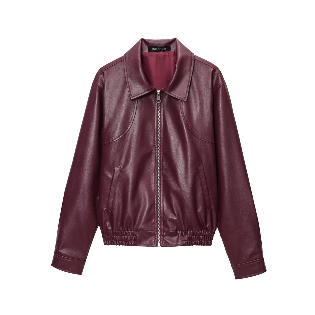 Damernas modiga konstläderjacka med elastisk midja och ståkrage Mirla-Eva Jonsson