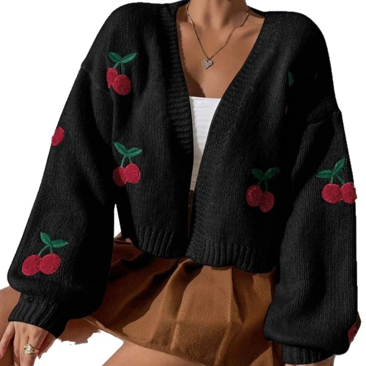 Damernas modiga stickad cardigan med fruktig broderi Mirla-Eva Jonsson
