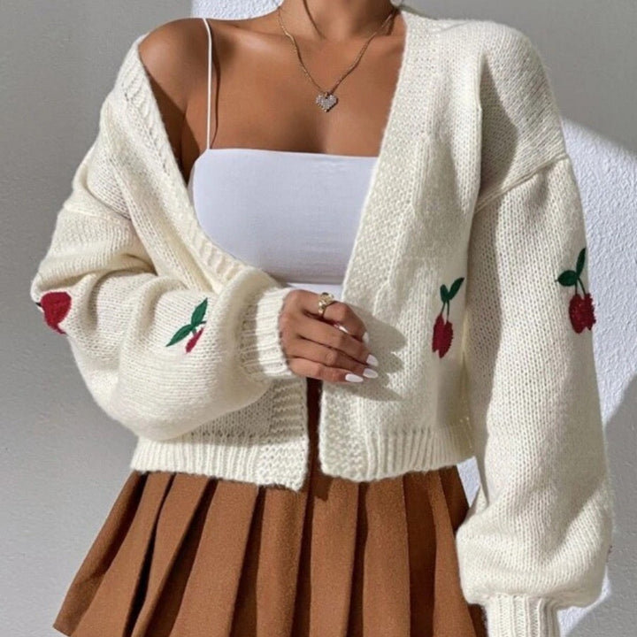 Damernas modiga stickad cardigan med fruktig broderi Mirla-Eva Jonsson