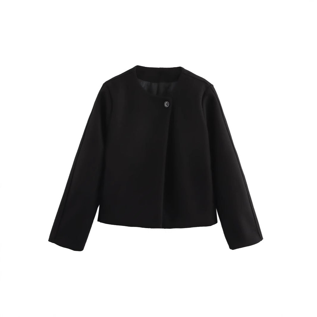 Damernas modiska kortjacka med minimalistisk design och elegant knappstängning Eva Jonsson-Eva Jonsson