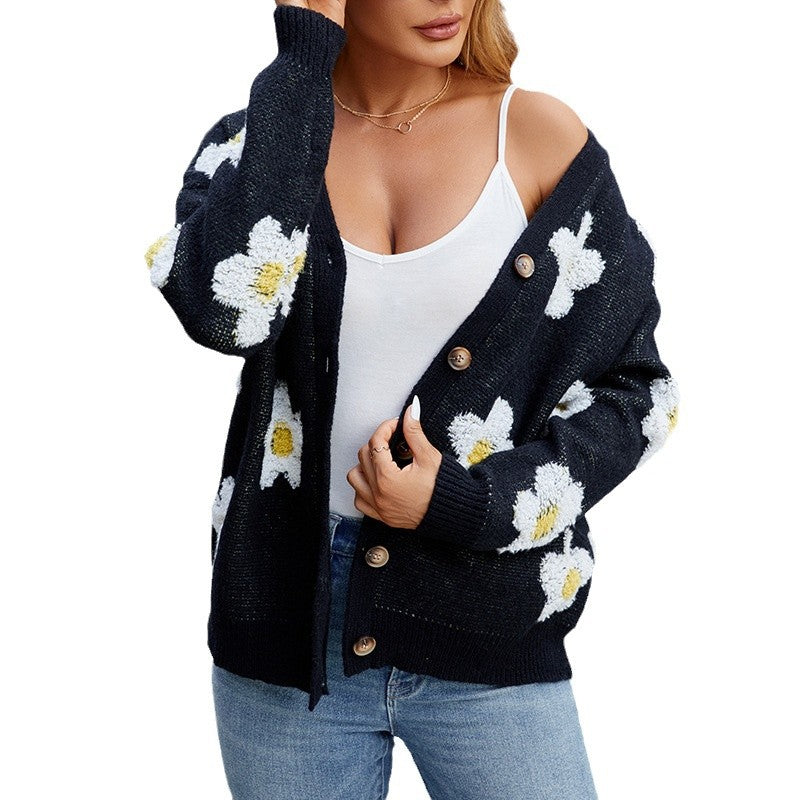 Damernas mysiga stickad cardigan med blommiga detaljer Mirla-Eva Jonsson