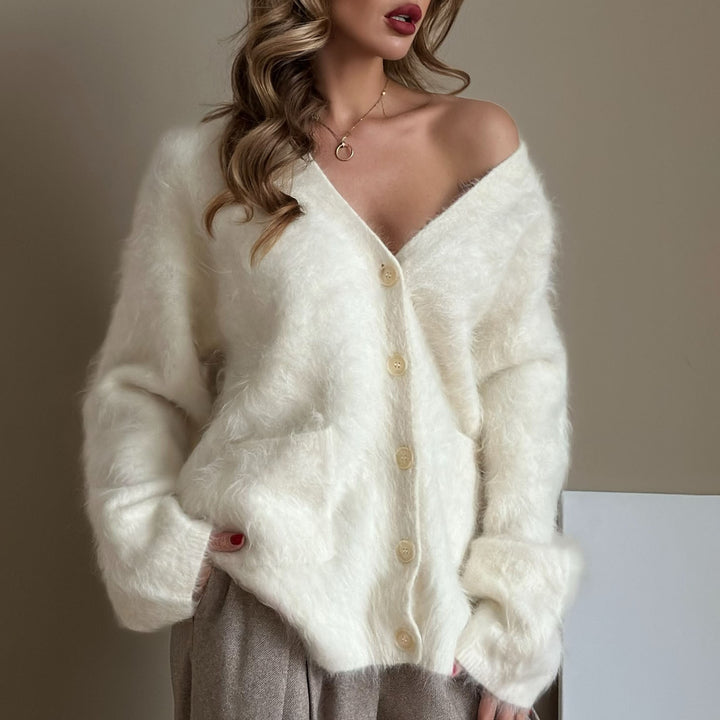 Damernas mysiga stickad jacka med oversized passform och knapplist Eva Jonsson-Eva Jonsson
