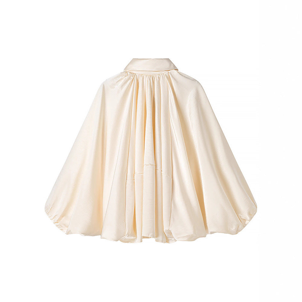 Damernas oversized blusenskjorta med elegant draperingsdesign Mirla-Eva Jonsson