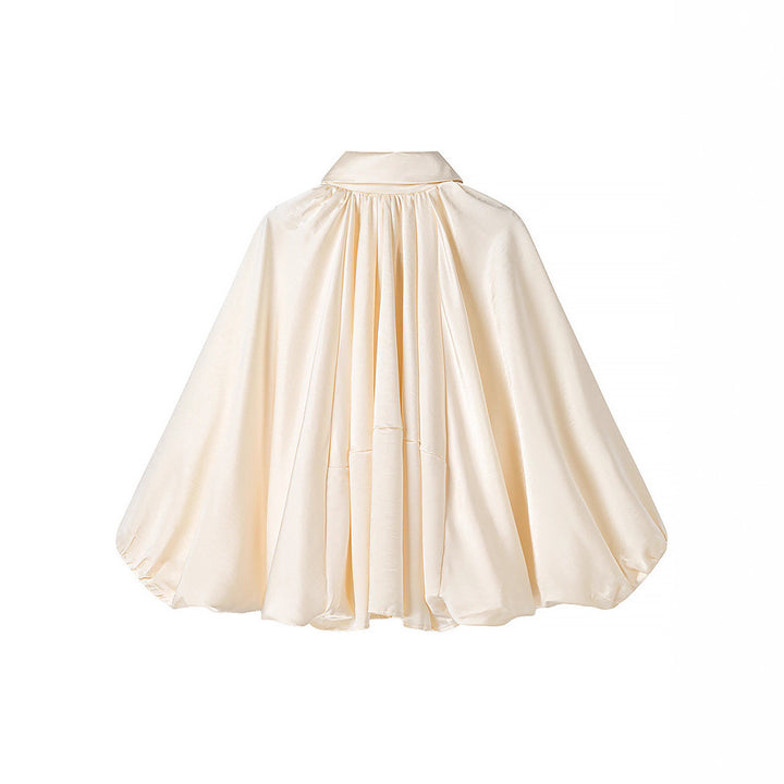 Damernas oversized blusenskjorta med elegant draperingsdesign Mirla-Eva Jonsson