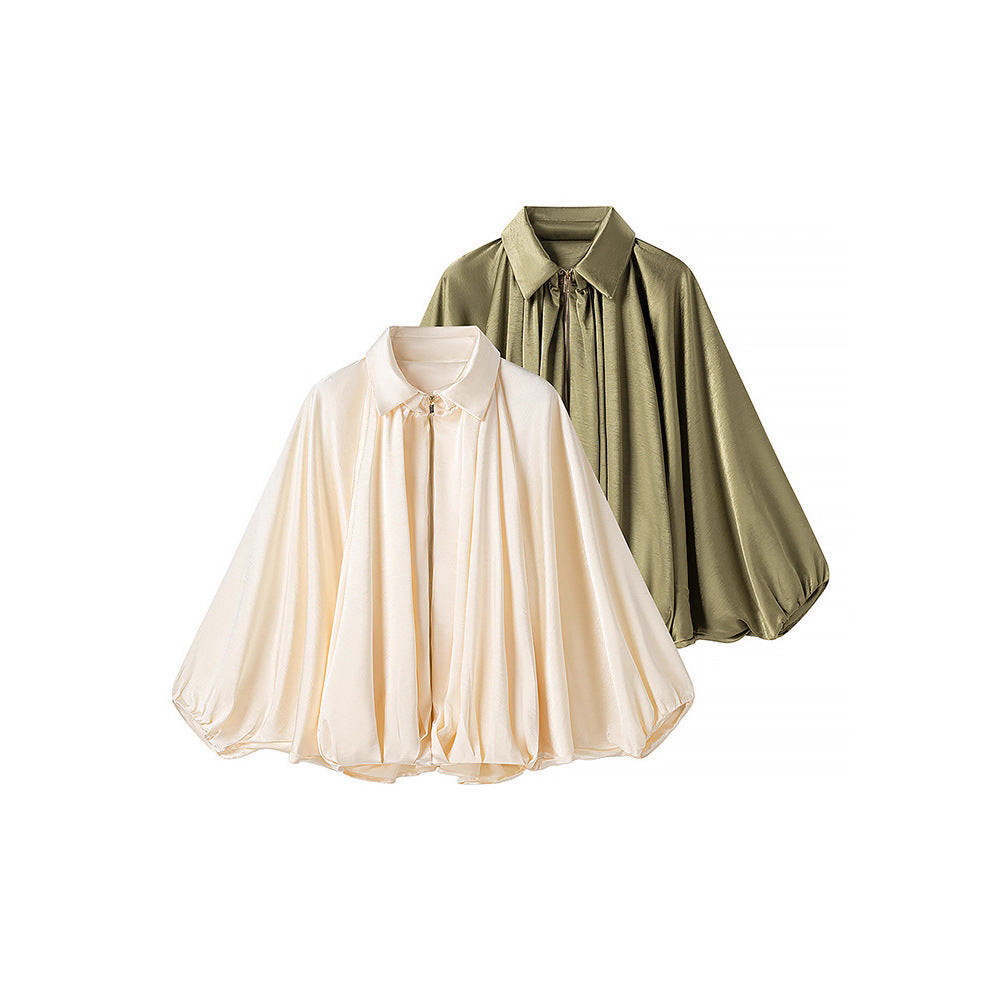 Damernas oversized blusenskjorta med elegant draperingsdesign Mirla-Eva Jonsson