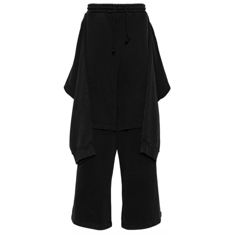 Damernas oversized fritidsbyxor med sidoinlägg och elastisk midja Mirla-Eva Jonsson