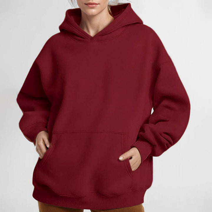 Damernas oversized hoodie med praktiska kengurutassar Mirla-Eva Jonsson