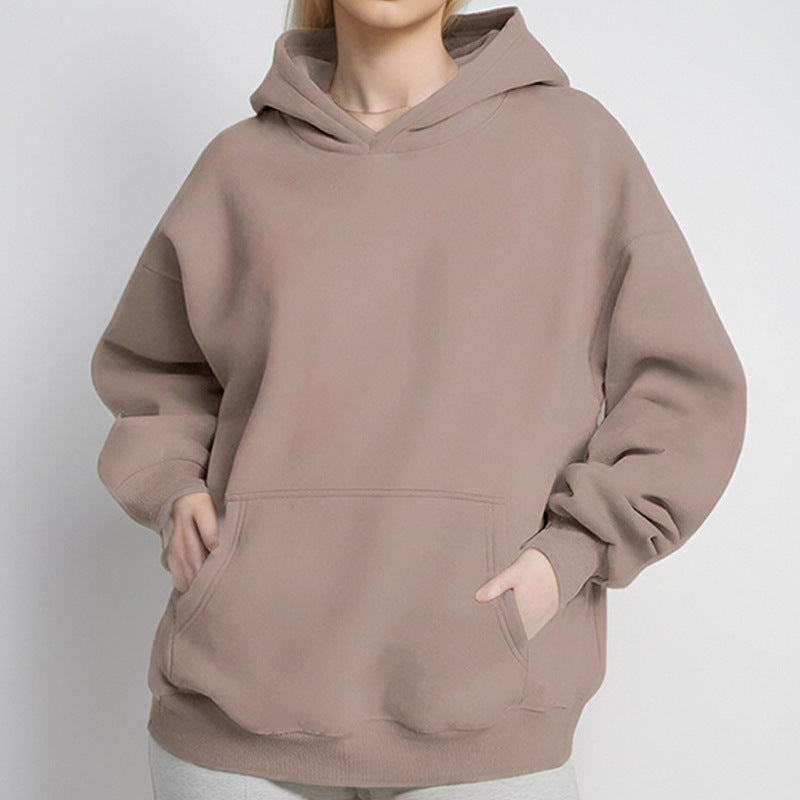 Damernas oversized hoodie med praktiska kengurutassar Mirla-Eva Jonsson