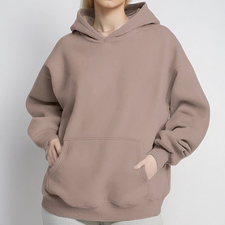 Damernas oversized hoodie med praktiska kengurutassar Mirla-Eva Jonsson