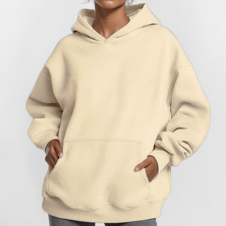 Damernas oversized hoodie med praktiska kengurutassar Mirla-Eva Jonsson
