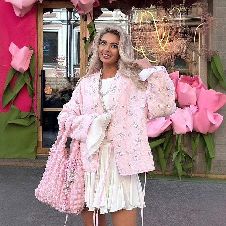 Damernas oversized jacka med blommönster Mirla-Eva Jonsson