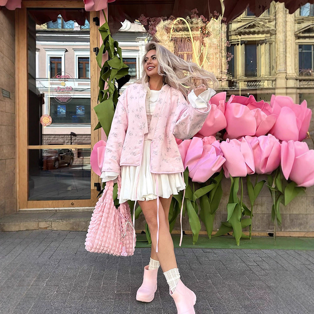 Damernas oversized jacka med blommönster Mirla-Eva Jonsson