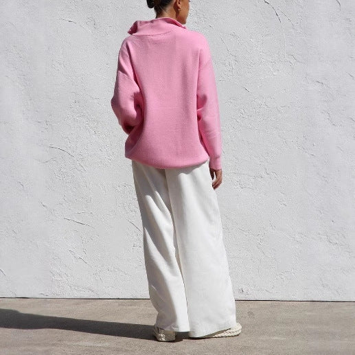 Damernas oversized pullover med halv dragkedja och känguruficka Mirla-Eva Jonsson