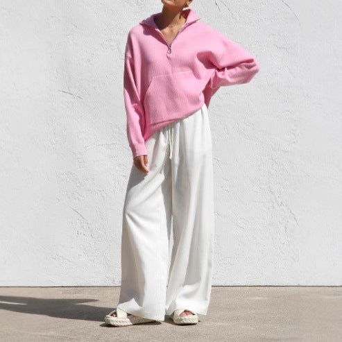 Damernas oversized pullover med halv dragkedja och känguruficka Mirla-Eva Jonsson