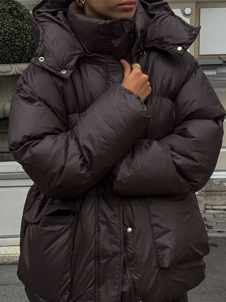 Damernas oversized quiltad jacka med hög krage och fickor Mirla-Eva Jonsson