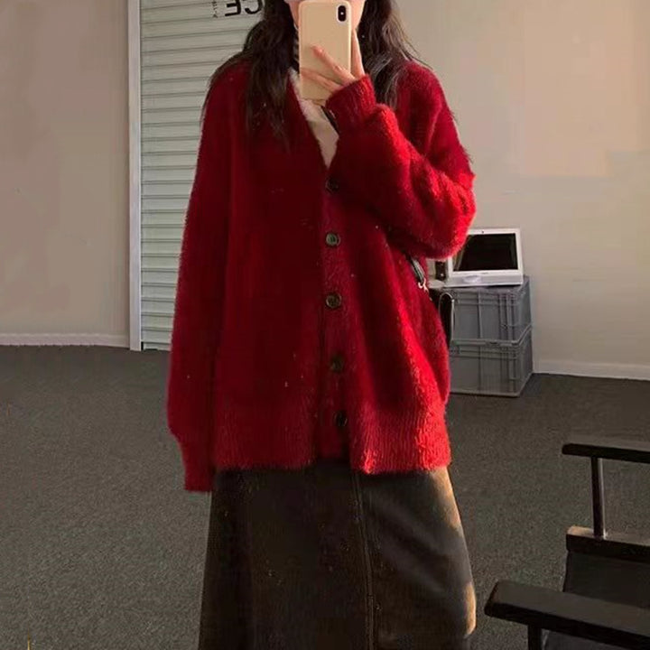 Damernas oversized stickad cardigan med knapppdetaljer Mirla-Eva Jonsson