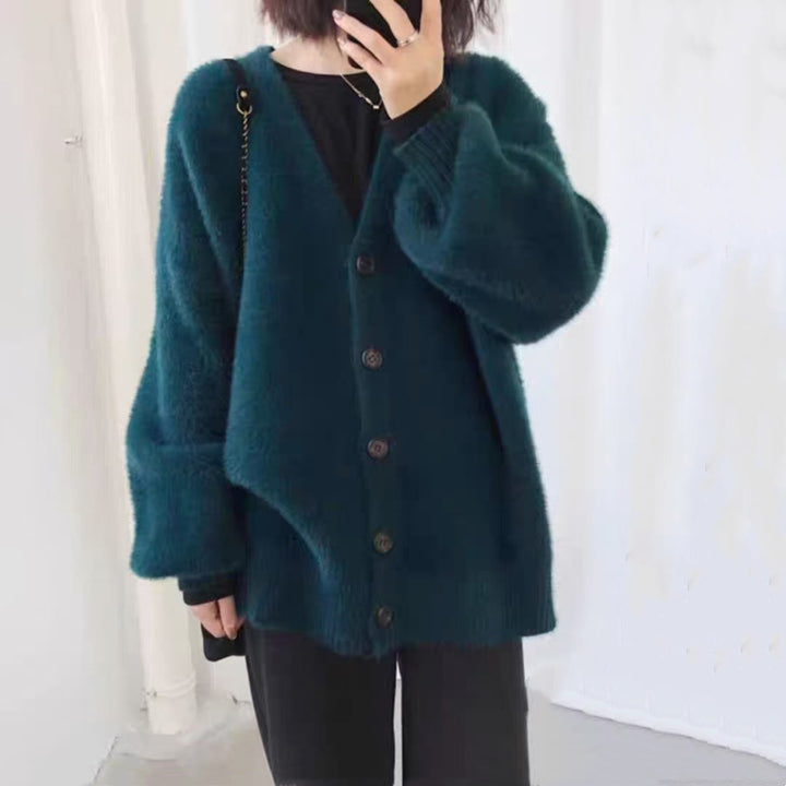 Damernas oversized stickad cardigan med knapppdetaljer Mirla-Eva Jonsson