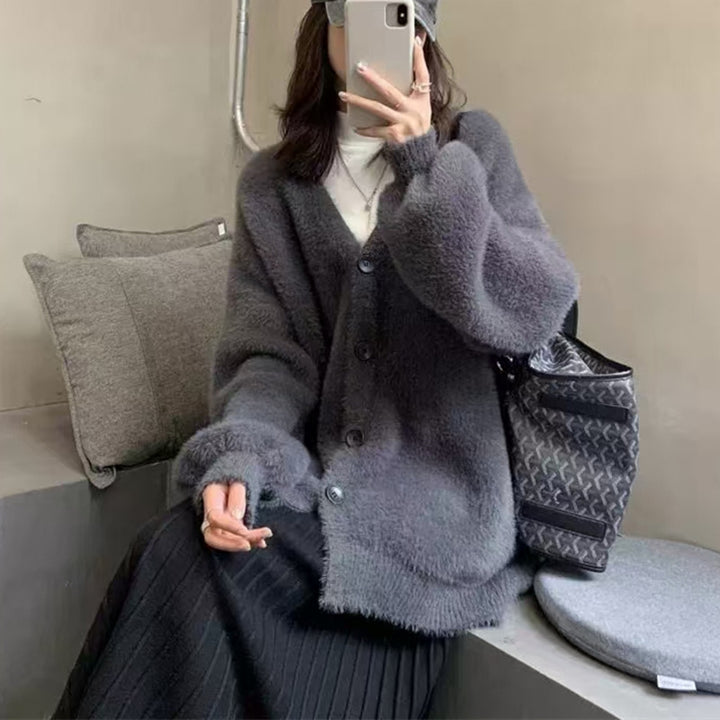 Damernas oversized stickad cardigan med knapppdetaljer Mirla-Eva Jonsson