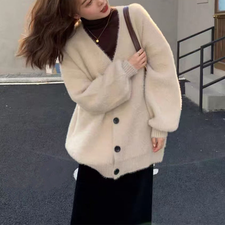 Damernas oversized stickad cardigan med knapppdetaljer Mirla-Eva Jonsson