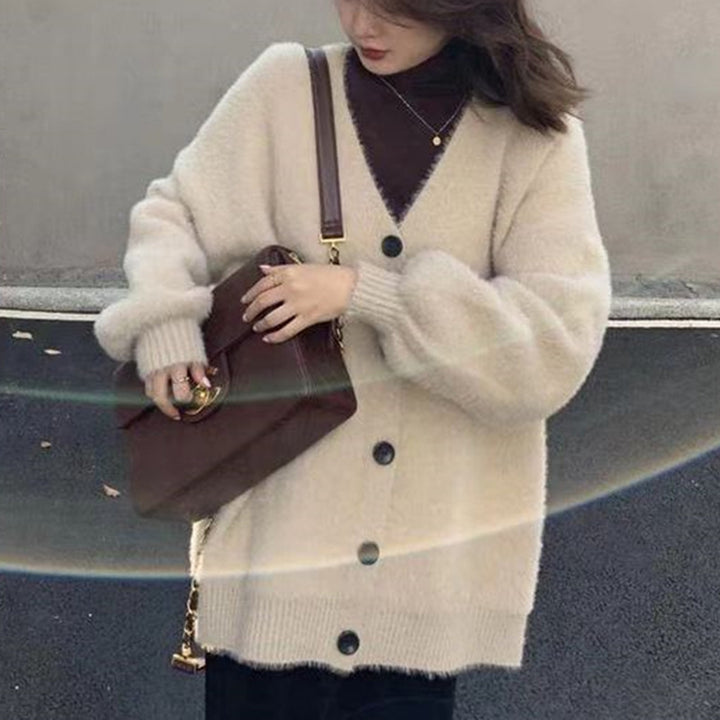 Damernas oversized stickad cardigan med knapppdetaljer Mirla-Eva Jonsson