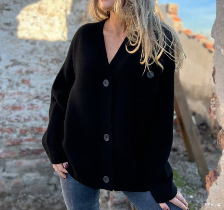 Damernas oversized stickad jacka med knappdetaljer Mirla-Eva Jonsson