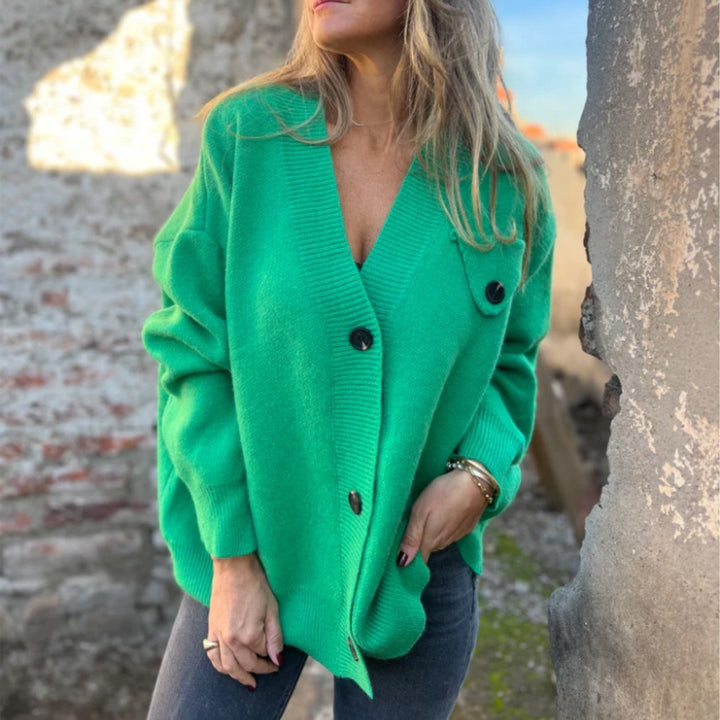 Damernas oversized stickad jacka med knappdetaljer Mirla-Eva Jonsson