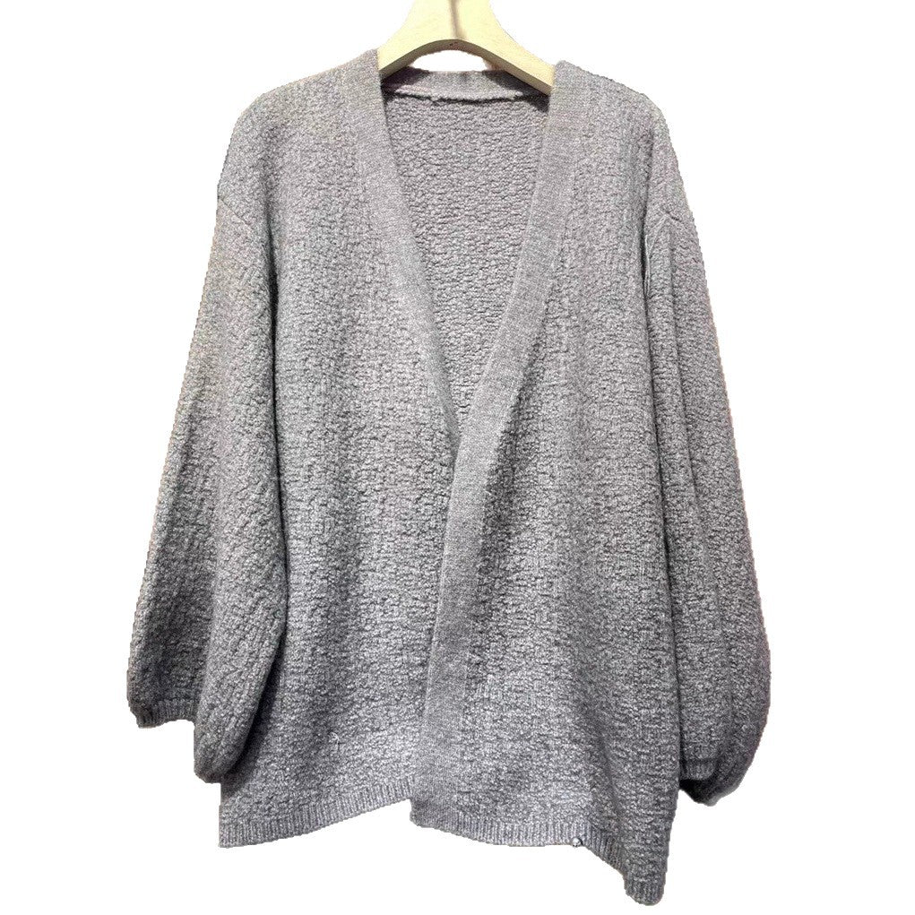 Damernas oversized stickad jacka med mjuka texturer och vida ärmar Mirla-Eva Jonsson