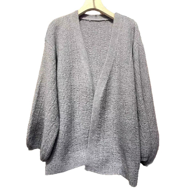 Damernas oversized stickad jacka med mjuka texturer och vida ärmar Mirla-Eva Jonsson