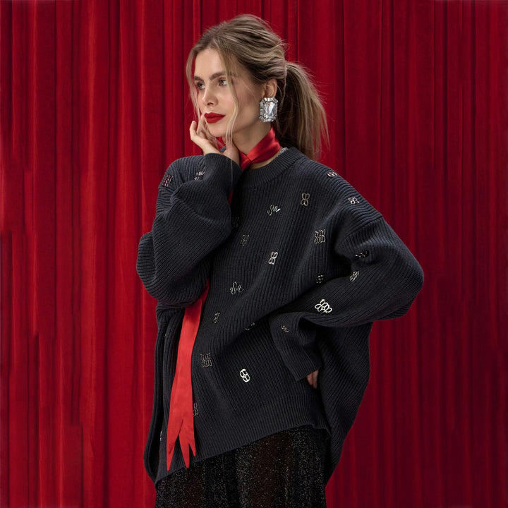 Damernas oversized stickad tröja med glittrande accenter Mirla-Eva Jonsson