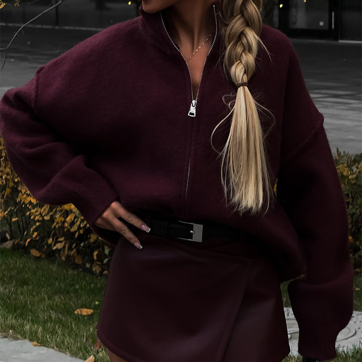 Damernas oversized stickad tröja med halv dragkedja Mirla-Eva Jonsson