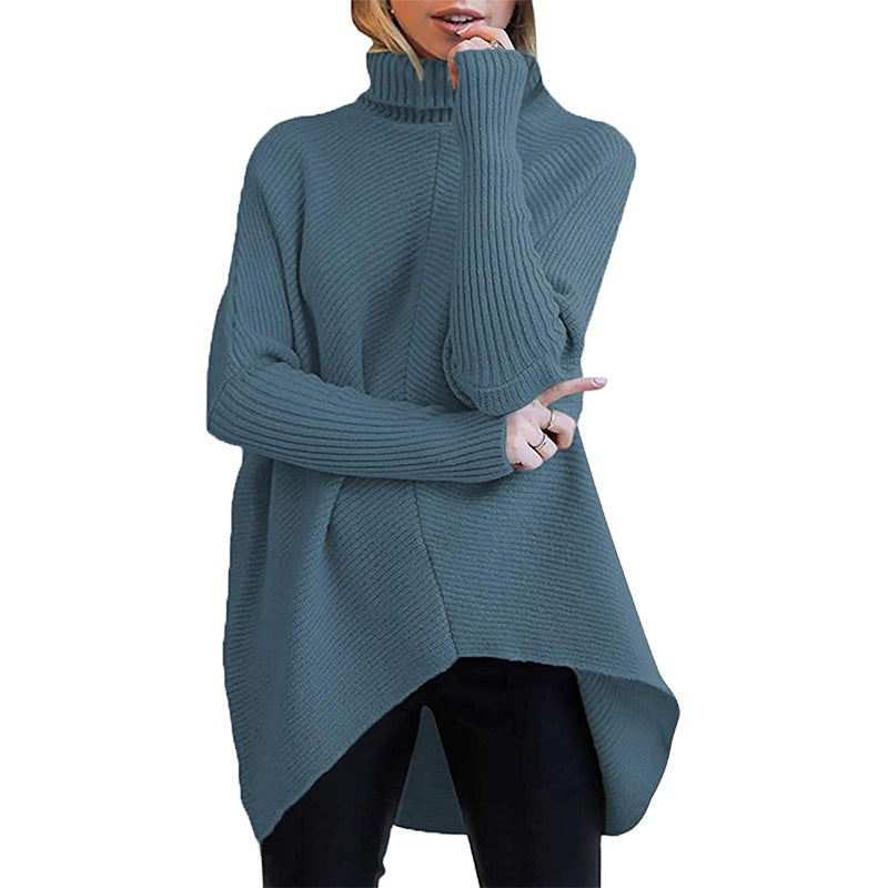 Damernas oversized stickad tröja med hög krage och strukturerad design Mirla-Eva Jonsson