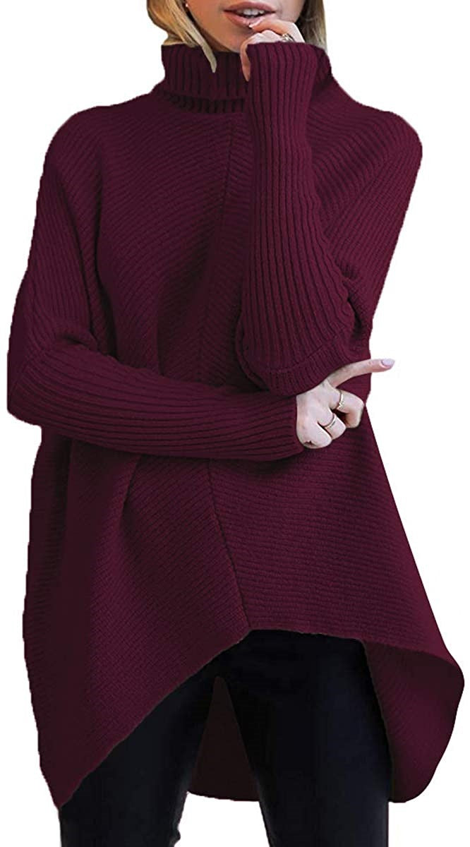 Damernas oversized stickad tröja med hög krage och strukturerad design Mirla-Eva Jonsson