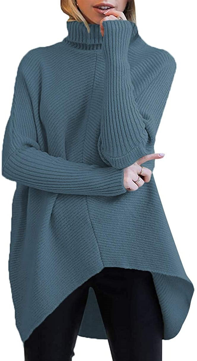 Damernas oversized stickad tröja med hög krage och strukturerad design Mirla-Eva Jonsson