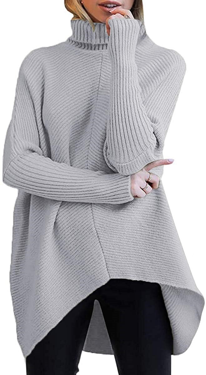 Damernas oversized stickad tröja med hög krage och strukturerad design Mirla-Eva Jonsson