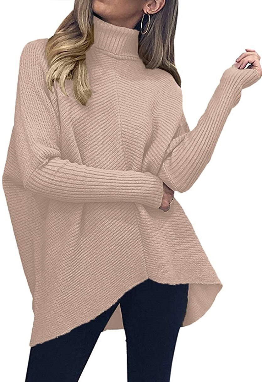 Damernas oversized stickad tröja med hög krage och strukturerad design Mirla-Eva Jonsson