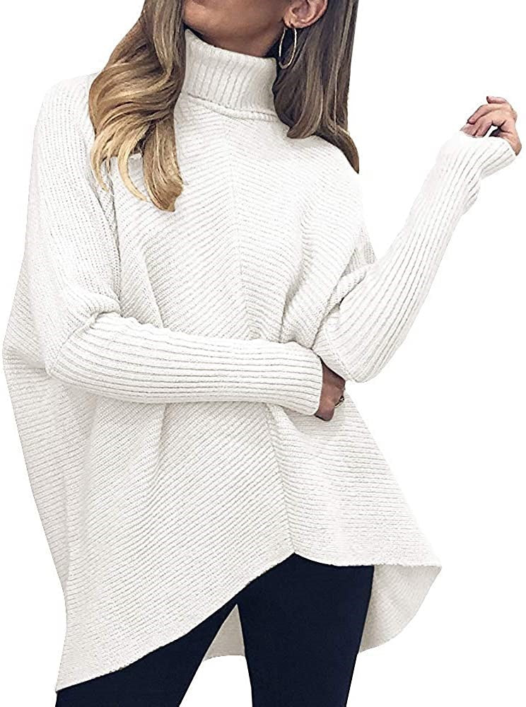 Damernas oversized stickad tröja med hög krage och strukturerad design Mirla-Eva Jonsson