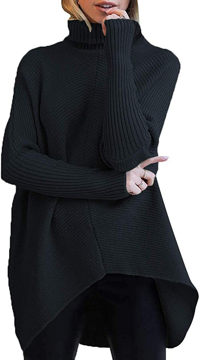 Damernas oversized stickad tröja med hög krage och strukturerad design Mirla-Eva Jonsson