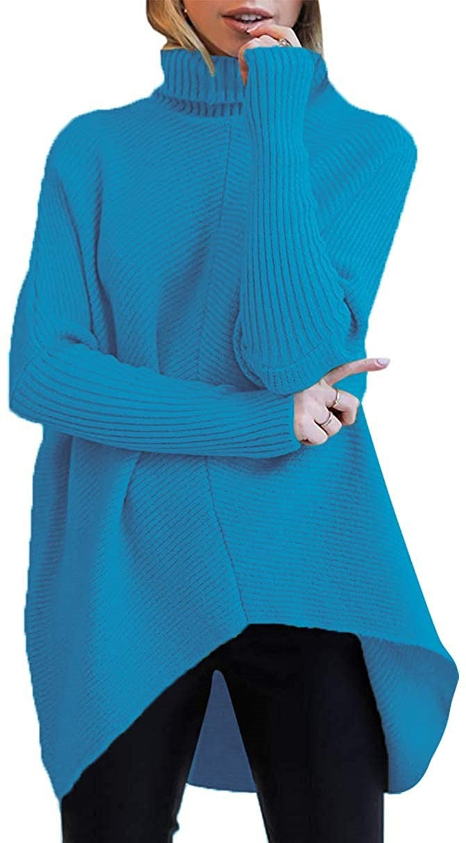 Damernas oversized stickad tröja med hög krage och strukturerad design Mirla-Eva Jonsson